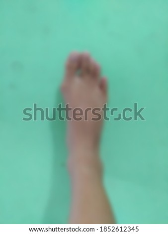 blurred photo of right foot