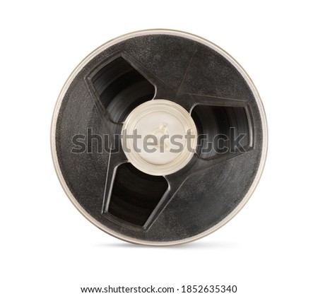 Vintage old magnetic audio tape reel isolated on white background with clipping path Royalty-Free Stock Photo #1852635340