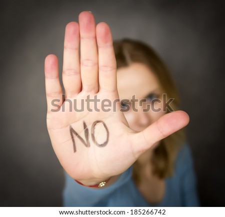 young woman showing her denial with NO on her hand Royalty-Free Stock Photo #185266742