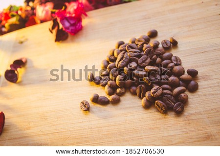 Coffee beans on a wooden Board