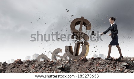 Young businesswoman crashing with hammer stone dollar symbol