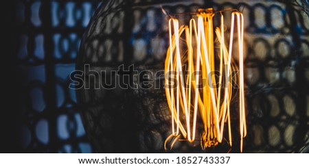 Decorative antique edison style light bulbs are in fact contamplorary LED light bulds made to look like old school. Creating old style look and saving energy	 Royalty-Free Stock Photo #1852743337