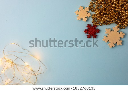 Decorated Christmas background with christmassy ornaments and decorations. Top view with copy space Christmas composition.