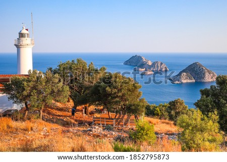 Gelidonya Lighthouse at Karaoz, Antalya, Turkey facing to Mediterranean sea and three Islands on Lycian Way.  Royalty-Free Stock Photo #1852795873