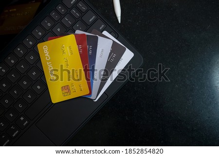 Credit cards on a Tablet keyboard concept for e-commerce, electronic banking, Internet banking and internet shopping