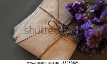 Envelopes with dry lavender. Stack of vintage letters tied with twine