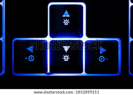 Blue backlit low profile keyboard.
