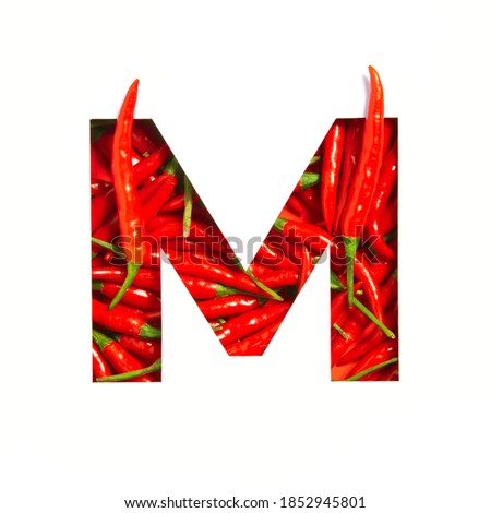 Letter M of English alphabet of hot red chili pepper and cut paper isolated on white. Font of spicy vegetables