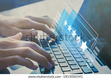 positive feedback, writing online review with 5 five star rating, reputation management concept Royalty-Free Stock Photo #1853000341