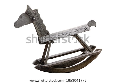 Wooden rocking horse isolated on white with clipping path