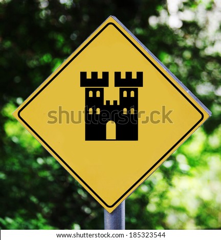 Yellow road sign with castle pictogram