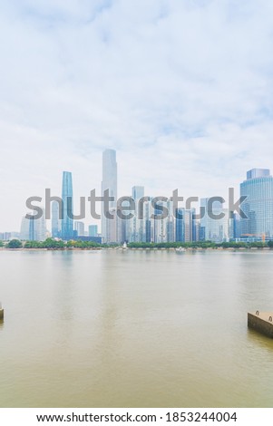 The scenery of the Pearl River and the skyline of modern urban buildings on both sides of Guangzhou City, Guangdong Province, China