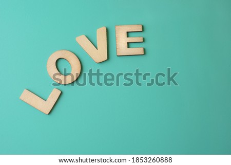 Wooden letters form word love. LOVE. Beautiful cute background. 