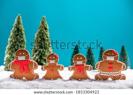 Christmas Festive Greeting Card. Funny Gingerbread Family in Face Mask