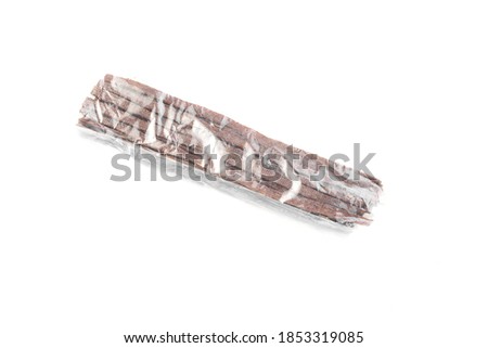 Packaging Dried beef meat sliced on stick, beer snack isolated on white background