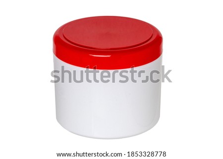Closeup of a closed white plastic jar or container for cosmetic gel or cream with a red cap isolated on a white background. Empty space. Macro.