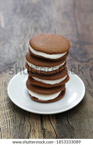 homemade chocolate whoopie pie with marshmallow filling