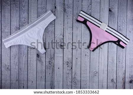 women's underwear panties on a wooden background