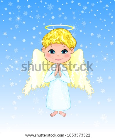 Little angel on a winter background. Angel boy with curls, with wings and a halo.