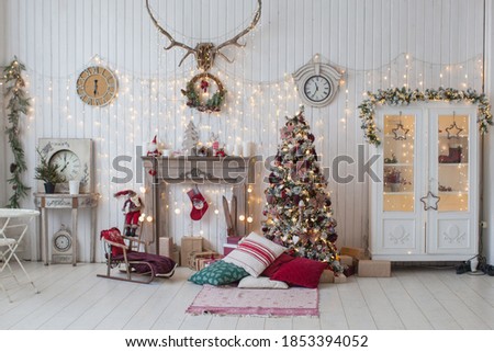 Christmas tree in classic red and white color. Interior. 
