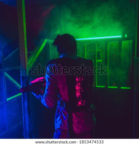 Laser tag play inside a building