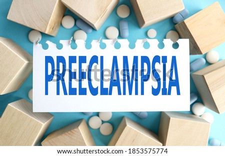 preeclampsia, text on white paper ON blue background