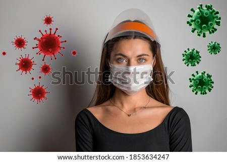 Cavid-19 Coronavirus.Stay at home stay safe concept.Young beautiful brunette wearing a mask for protection.show a stop-hand gesture to stop the coronavirus outbreak.