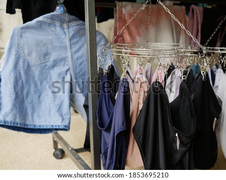 dry underwear hanging on the cloth rack after wash.