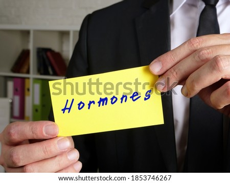Financial concept about Hormones  with sign on the page.
