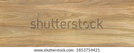 Plywood sheet surface of brown colour with wood pattern for background. Strong thin wooden board for construction or finishing and also use in ceramic wall and floor tiles
