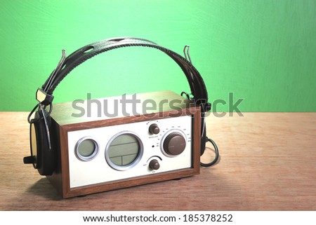 modern radio and headphones retro style,  mint green background