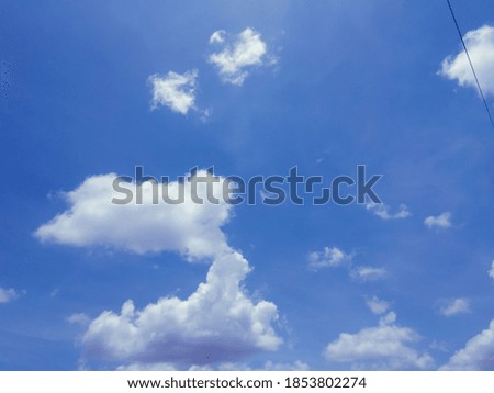 Beautiful Natural White Clouds On The Blue Sky