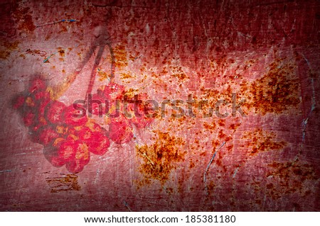Rust old wall texture with red fruits for background or decoration