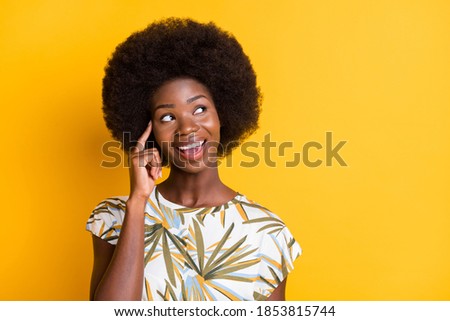 Close up photo of pretty attractive lady finger on the temple look empty space isolated on bright yellow color background Royalty-Free Stock Photo #1853815744
