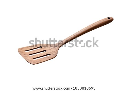 Wooden spatula on white background. Royalty-Free Stock Photo #1853818693