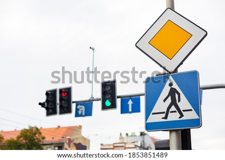 Road signs Main road and Crosswalk traffic lights on background