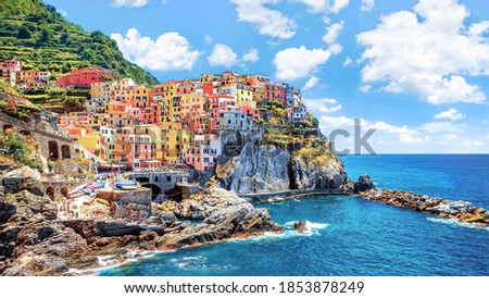 Beautiful view of the city on the rock, Manarola, Italy, Liguria, Cinque Terre. Royalty-Free Stock Photo #1853878249