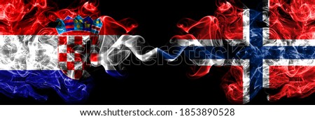 Croatia, Croatian vs Norway, Norwegian smoky mystic flags placed side by side. Thick colored silky abstract smoke flags.