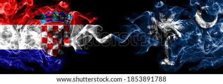 Croatia, Croatian vs United States of America, America, US, USA, American, South Carolina smoky mystic flags placed side by side. Thick colored silky abstract smoke flags.