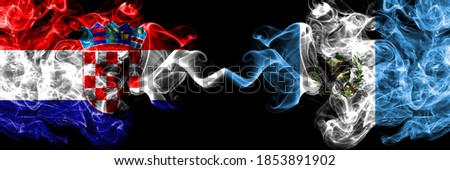 Croatia, Croatian vs Guatemala smoky mystic flags placed side by side. Thick colored silky abstract smoke flags.