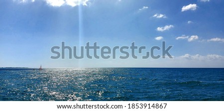 Panorama of blue endless sea and blue sky on a sunny day.. High quality photo