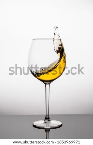 Splash of wine in a glass