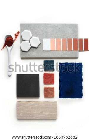 Top view moodboard. Material samples. Blue, red, orange, black, light wood.A spoonful of red color          