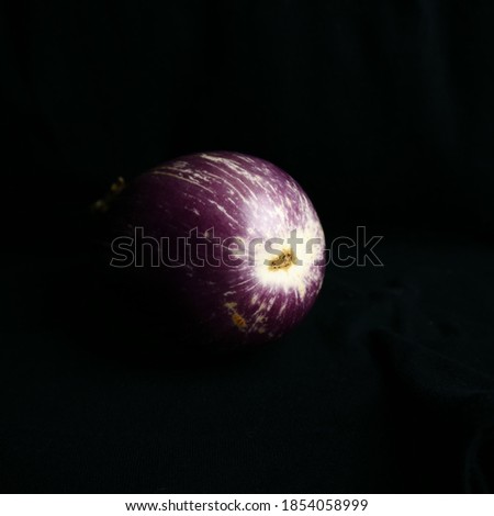 eggplant fruit on a black background