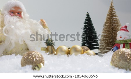 Christmas background Santa Claus and snowman in the snow