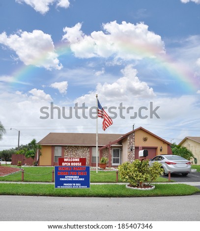 Rainbow Blue Sky Clouds Suburban Ranch style Brownstone home residential neighborhood USA