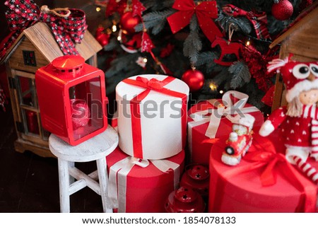 Christmas gifts with bows under the Christmas tree