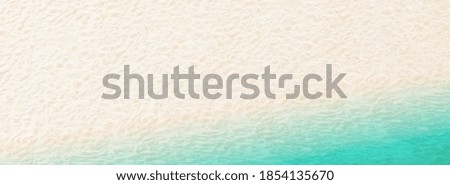 Aerial view of sandy beach and ocean, banner size, copy space for individual text