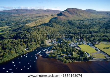 Aerial view of Balmaha Scottish village at Loch Lomond Royalty-Free Stock Photo #1854143074