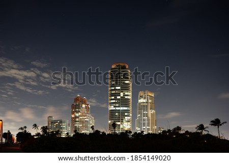 Highrise condos Miami Beach on a night sky long exposure photo